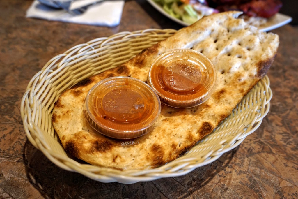 Naan with Chutney. Please excuse the piece missing, we got hungry.