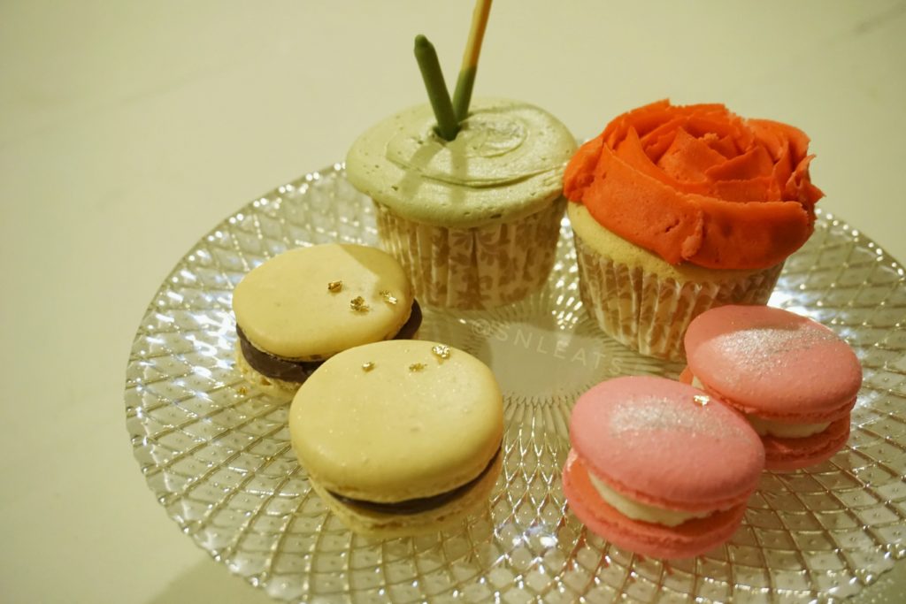 (left to right) Nutella macarons, Matcha fluffy cotton cupcake, cherry blossom fluffy cotton cupcake, cherry blossom macarons